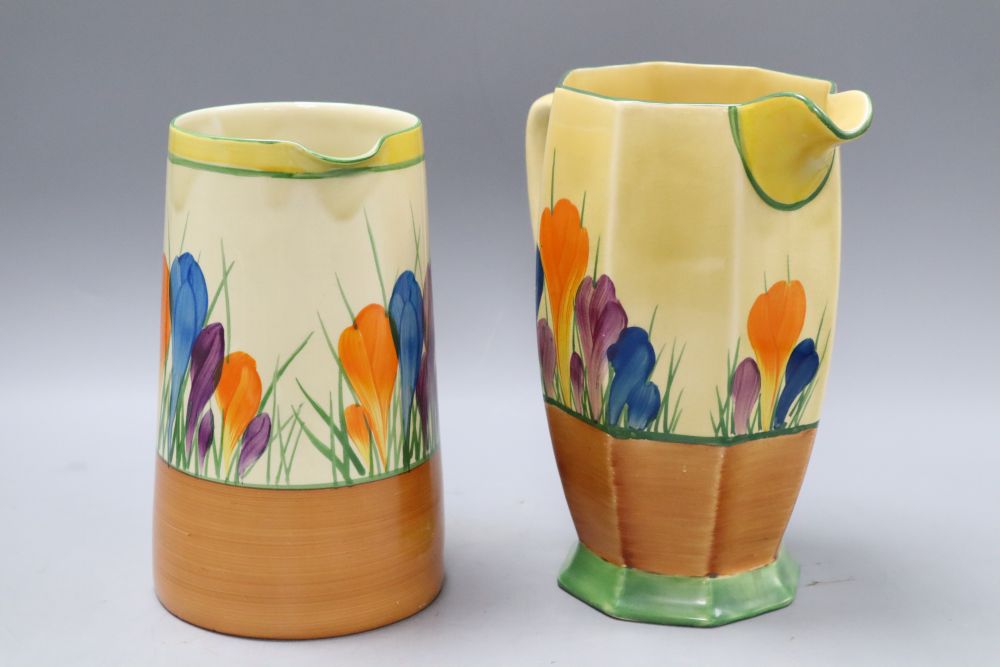 Two Clarice Cliff crocus pattern jugs, tallest 20cm